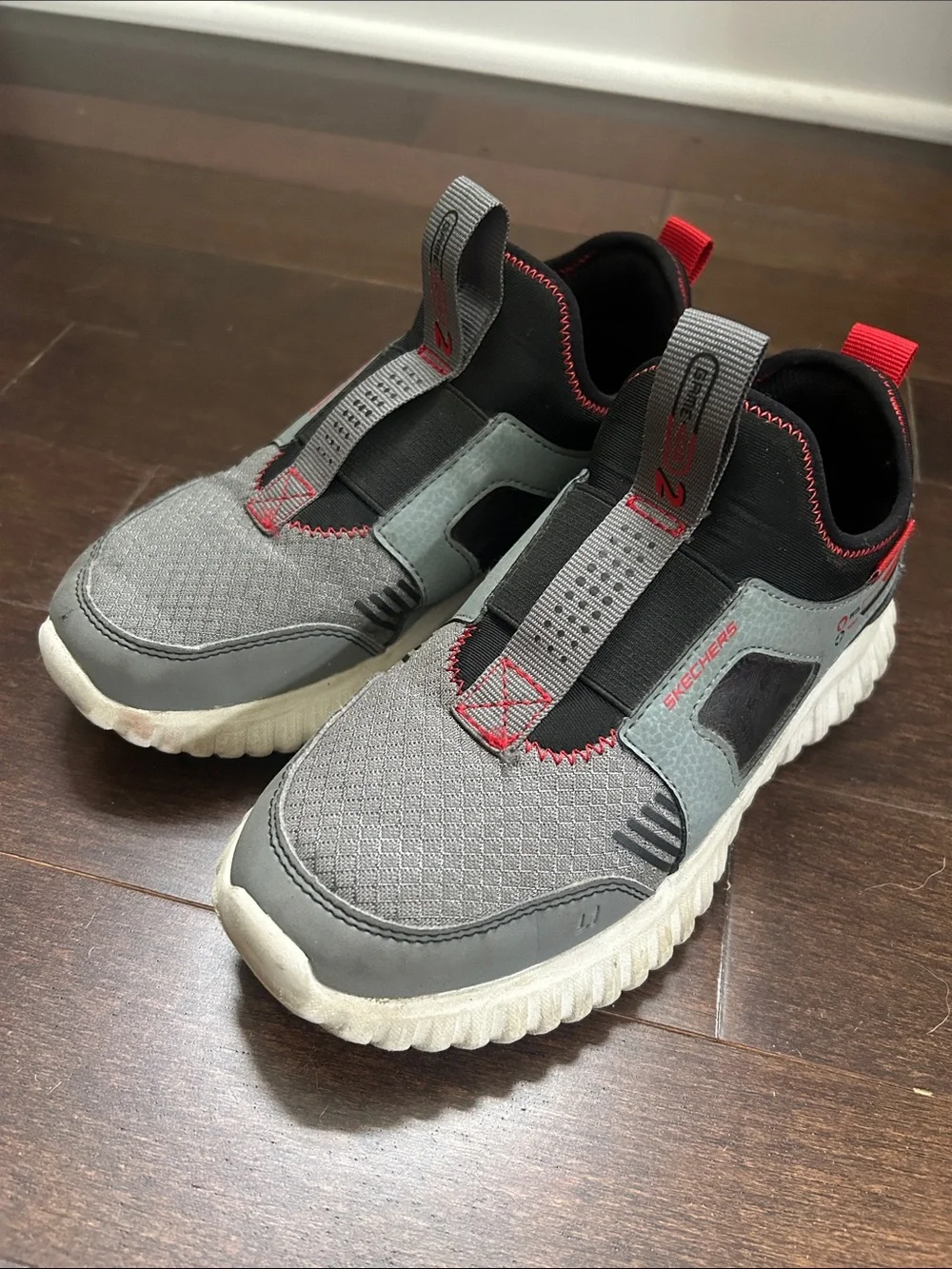 Skechers Kids Gray and Red Slip-On Athletic Sneakers
